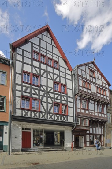 Half-timbered houses, pedestrians, Orchheimer Straße, Bad Münstereifel, Ahrgebirge, Eifel, North Rhine-Westphalia, Germany