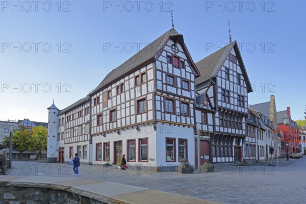 Half-timbered houses, pedestrians, market, Marktstraße, Bad Münstereifel, Ahrgebirge, Eifel, North Rhine-Westphalia, Germany
