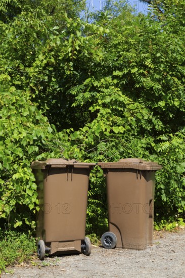 Brown plastic portable composting bins for depositing organic materials and leftover foods in, Quebec, Canada