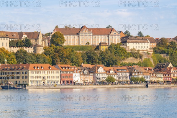 Historic buildings along the lakeshore, surrounded by hills, Meersburg, Lake Constance, Germany