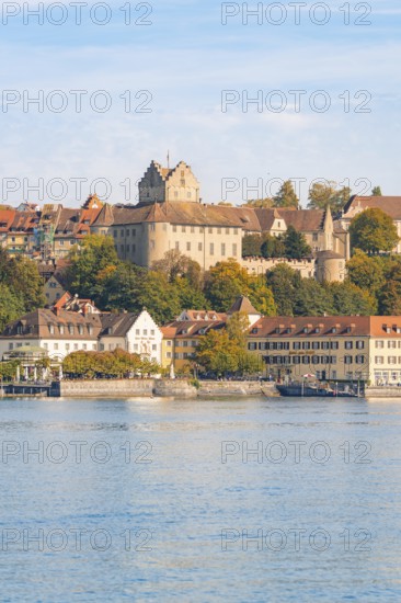 Castle and historic buildings on the lake, hills and autumn colours, Meersburg, Lake Constance, Germany
