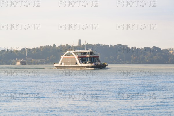 Ferry at sea, wooded horizon, quiet atmosphere, Meersburg, Lake Constance, Germany