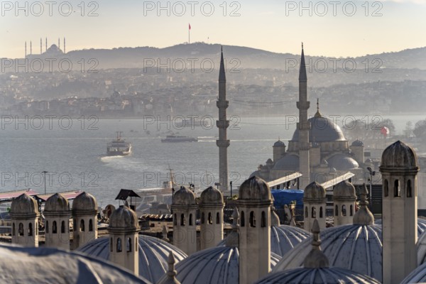 View over the roofs of the Süleymaniye Mosque to the New Mosque Yeni Cami and the Bosporus, Istanbul, Turkey