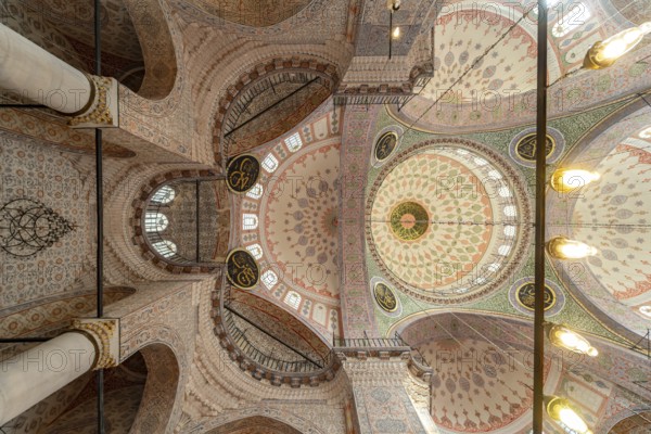 Interior and domes of the New Mosque Yeni Camii in Istanbul, Turkey
