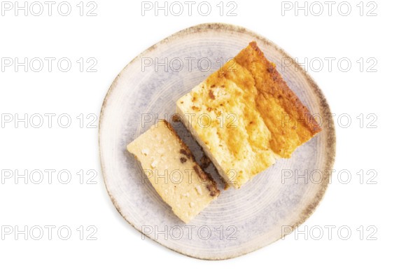 ?ottage cheese ?asserole, Curd cake, with dried apricots and raisins Isolated on white background, top view, flat lay, close up, minimalism