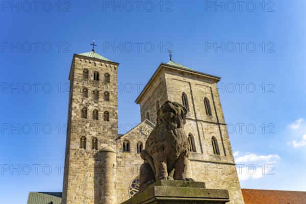 Lion poodle figure in front of St Peter's Cathedral in Osnabrück, Lower Saxony, Germany