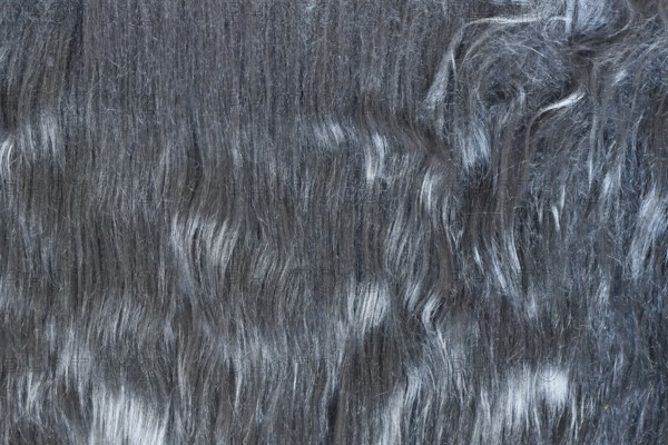 Close up of dark gray synthetic fake fur