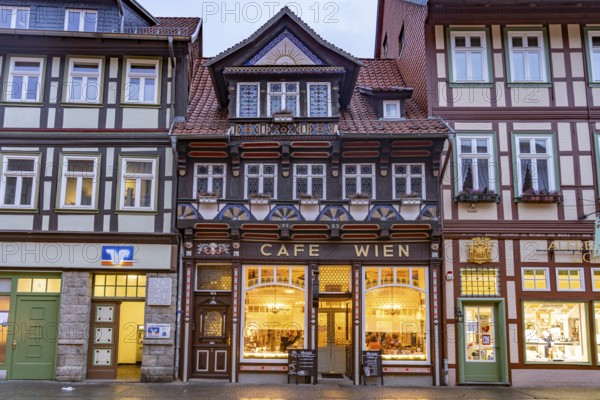 Half-timbered houses with the Cafe Wien in the old town centre of Wernigerode, Saxony-Anhalt, Germany