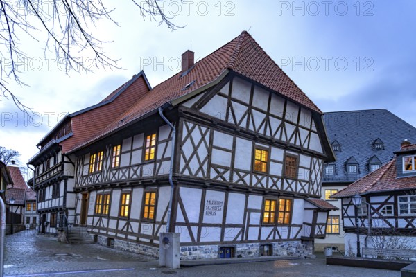 Half-timbered house museum Schiefes Haus at dusk, Wernigerode, Saxony-Anhalt, Germany