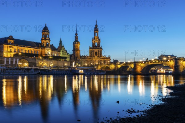 Old town skyline with Brühl's Terraces, Sanctissimae Trinitatis Cathedral, Residential Palace, Higher Regional Court, paddle steamer on the Elbe in the blue hour, reflection, Dresden, Saxony, Germany