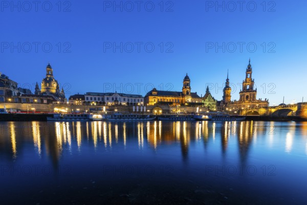 Old town skyline with Brühl's Terraces, Kunstakdeimie, Church of Our Lady, Residenzschloss, Higher Regional Court, Cathedral Sanctissimae Trinitatis, paddle steamer on the Elbe in the Blue Hour, reflection, Dresden, Saxony, Germany