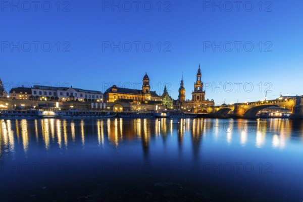 Old town skyline with Brühl's Terraces, Kunstakademie, Church of Our Lady, Higher Regional Court, paddle steamer on the Elbe in the blue hour, reflection, Dresden, Saxony, Germany