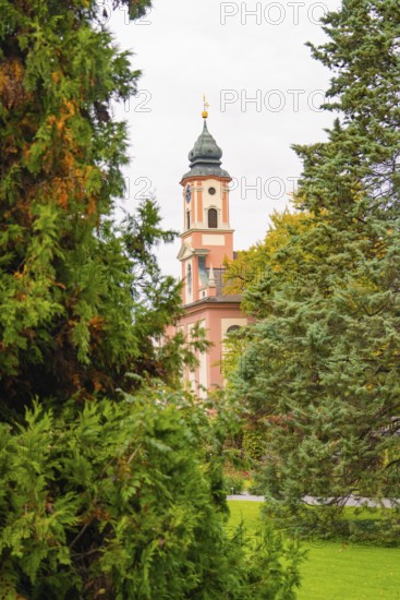 A tower with striking architecture can be seen between green trees, Mainau Island, Lake Constance, Germany