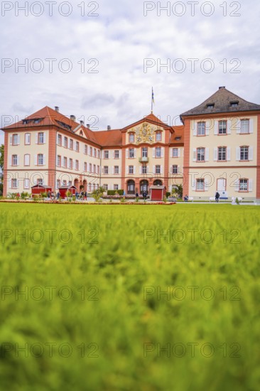Historic castle with manicured lawn in the foreground, Mainau flower island, Lake Constance, Germany