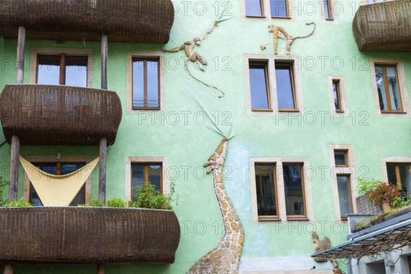 Rattan balconies on an ornate house in the trendy Neustadt neighbourhood, Dresden, Saxony, Germany