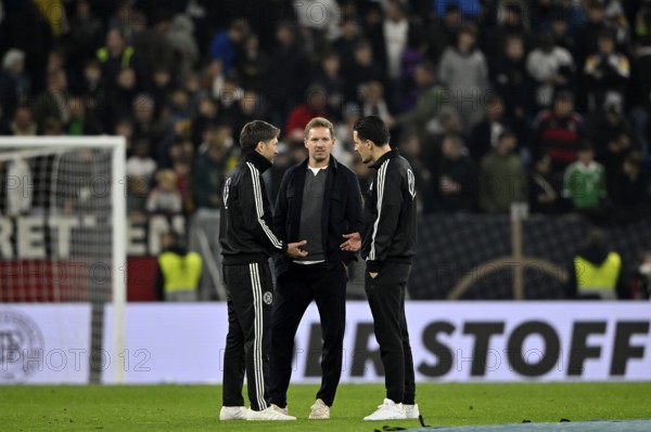 National coach Coach Coach Julian Nagelsmann GER in discussion with assistant coach Coach Benjamin Hübner GER Assistant coach Coach Benjamin Glück GER World Cup qualifier, international match, Germany vs. Luxembourg, PreZero Arena, Sinsheim, Baden-Württemberg, Germany