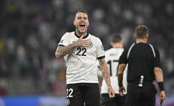 Goal celebration David Raum GER (22) Gesture Gesture Referee Referee Nenad Minakovic World Cup qualifier, international match, Germany v Luxembourg, PreZero Arena, Sinsheim, Baden-Württemberg, Germany