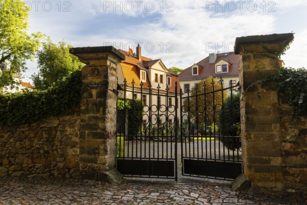 Iron gate on stone wall, Old Town, Meissen, Saxony, Germany