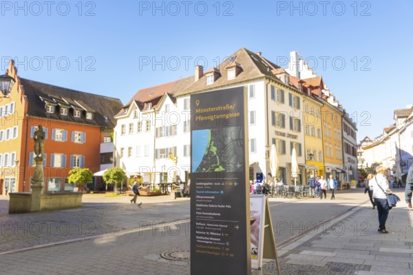 A lively square with historic buildings and cafés in bright sunshine, Überlingen, Lake Constance, Germany