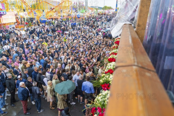 Large crowds at a colourful festival with a cheerful atmosphere, Cannstatter Wasen folk festival, Stuttgart, Germany