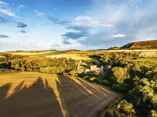 Ruins of Hailes Castle over River Tyne from a drone, East Linton, East Lothian, Scotland, UK