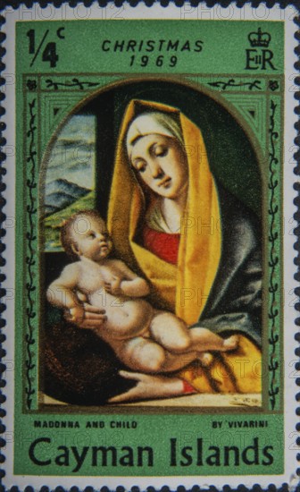 Madonna and Child, traditional religious motif in Catholic countries. Image on Cayman Islands postage stamp