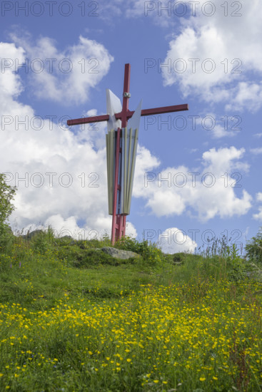 Colourful summit cross on the Mugel, Niklasdorf, Styria, Austria