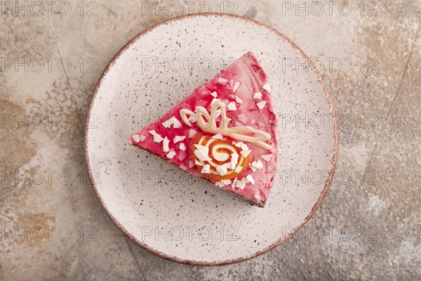 Chocolate cake on brown concrete background, top view, flat lay, close up