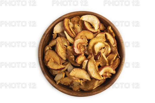Dried Apples in wooden bowl isolated on white background. Top view, close up, flat lay. healthy food, minimalism. sweet