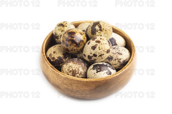 Pile of Raw Quail eggs isolated on white background. side view, close up
