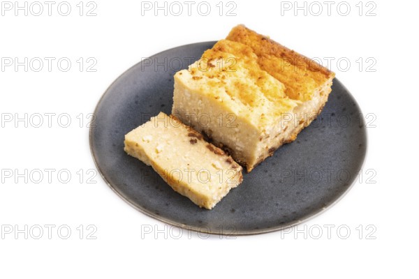 ?ottage cheese ?asserole, Curd cake, with dried apricots and raisins Isolated on white background, side view, close up, minimalism