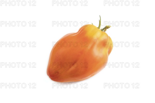 Red Heart Shape tomato isolated on white background. Side view, copy space. healthy food, vegetable, minimalism