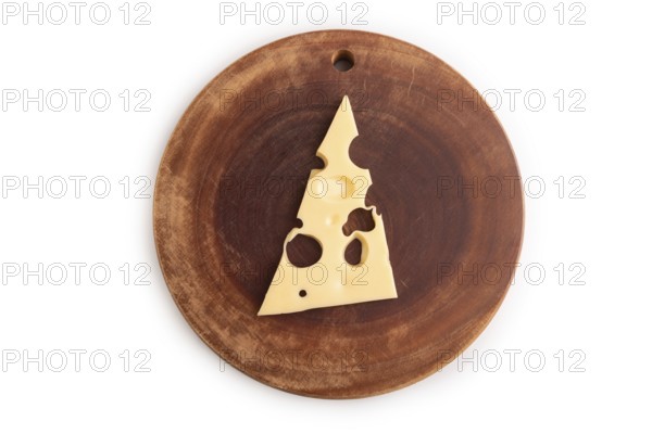 Piece of cheese with holes on cutting board isolated on white background, top view, flat lay, copy space, minimalism
