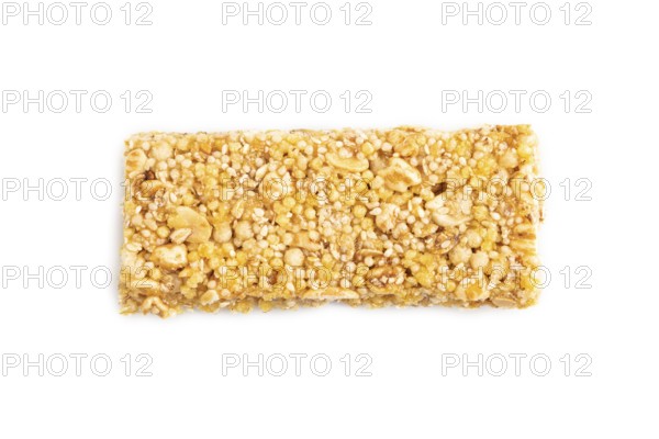 Granola bar with, caramel, nuts, flakes isolated on white background. Top view, flat lay, close up