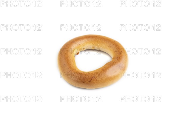 Homemade Ring Bagel isolated on white background. side view, close up