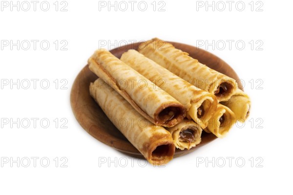Waffles with caramel isolated on white background, side view, close up
