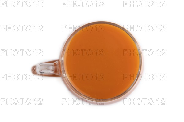 Two glasses with carrot juice isolated on white background. Diet, healthy eating concept. Top view, flat lay, close up, minimalism