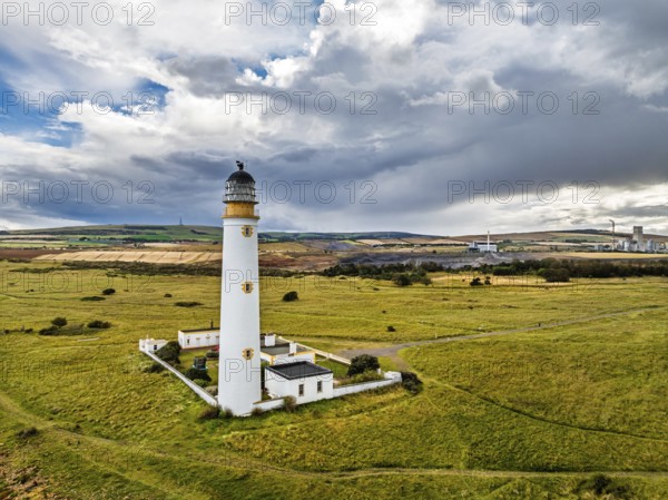 Rain Clouds over Barns Ness Lighthouse from a drone, Dunbar, East Lothian, Scotland, UK