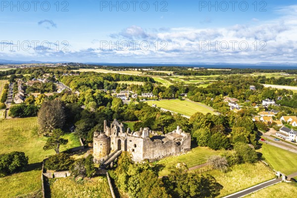 Ruins of Dirleton Castle & Gardens from a drone, Dirleton, East Lothian, Scotland, UK