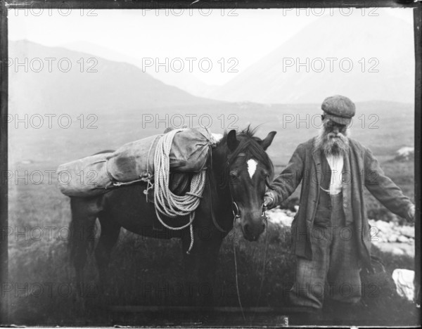 Old man with pack horse carrying mountaineering equipment, thought to be Cuillin mountains, Skye, Scotland, UK c 1900-1920