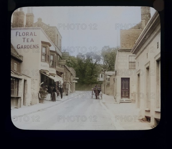 Shops and tea gardens advertised on buildings, Pegwell Bay, Ramsgate, c 1900 the building on the right is now the Belle Vue Tavern