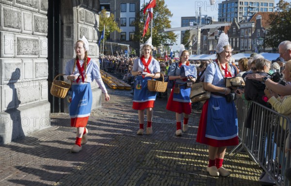 Group of woman in traditional dress, cheese market, Alkmaar, Alkmar, Noord-Holland, North Holland, Netherlands