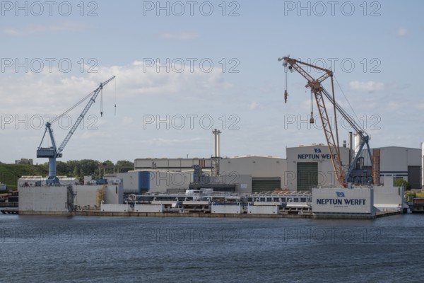 Neptun shipyard with large cranes and industrial buildings, harbour, Warnemünde, Rostock, Mecklenburg-Vorpommern, Germany