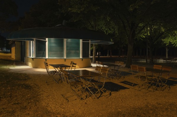 Night shot of a closed kiosk with seating in the Herrenhausen Gardens, Herrenhausen, Hanover, Lower Saxony, Germany
