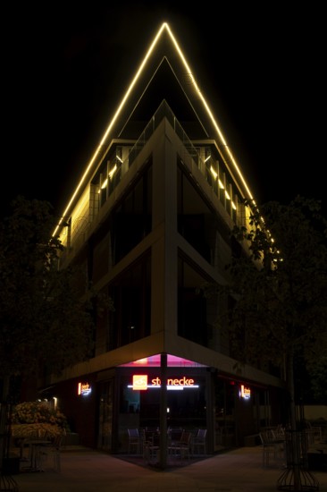 Night shot of a striking building in Hanover Herrenhausen, Hanover, Lower Saxony, Germany