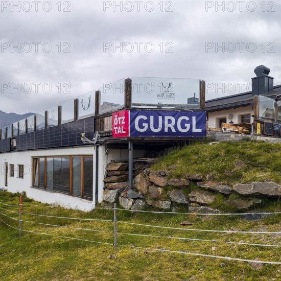 Mountain restaurant Hohe Mut Alm on the mountain pasture of the same name in Gurgl, Tyrol, Austria, for editorial use only