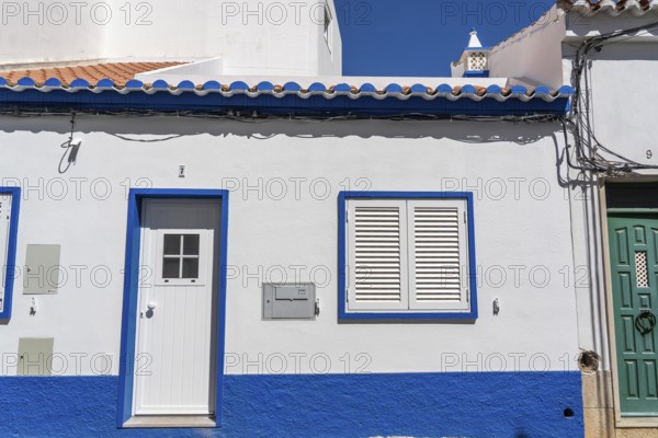 Facade of buildings in Tavira, old town, in the east of the Algarve, Portugal