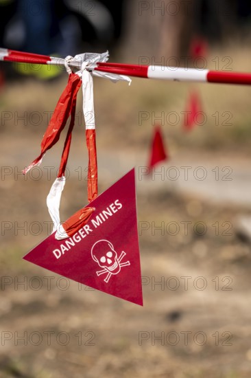 Civil defence exercise scenario, after a drone attack on a residential area, emergency services clear the area, marked mines and explosive devices, at the large-scale exercise FÜLEX25, of the THW, Technisches Hilfswerk, Landesverband North Rhine-Westphalia, on 4 weekends over 3500 volunteers from the 127 North Rhine-Westphalia local associations practice many different deployment scenarios, from the field of disaster control and civil defence