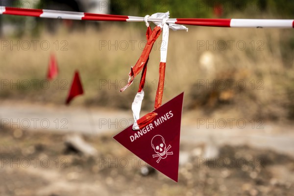 Civil defence exercise scenario, after a drone attack on a residential area, emergency services clear the area, marked mines and explosive devices, at the large-scale exercise FÜLEX25, of the THW, Technisches Hilfswerk, Landesverband North Rhine-Westphalia, on 4 weekends over 3500 volunteers from the 127 North Rhine-Westphalia local associations practice many different deployment scenarios, from the field of disaster control and civil defence