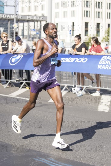 Guye Adola (ETH), later in 4th place, at KM38 in front of Potsdamer Platz at the 51st BMW Berlin Marathon 2025 on 21/09/2025